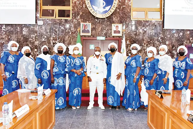 The Immediate Past Chief of the Naval Staff, Vice Admiral AZ Gambo (Admiralty Medal) in a group photograph with the Immediate Past President of NOWA, Hajiya Nana Aisha Gambo and her NOWA Executives during a courtesy visit to the Naval Headquarters, Abuja