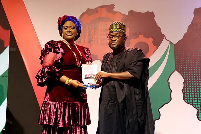 The immediate past President of NOWA, Hajiya Nana Aisha Gambo receiving African Industrial and Development Conference Award (AIDCA) of Outstanding Humanitarian of the year